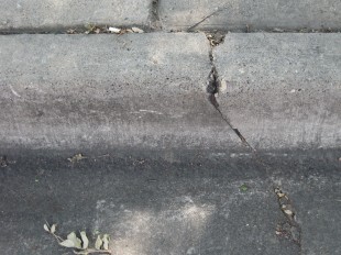 grunge cement curb crack sidewalk